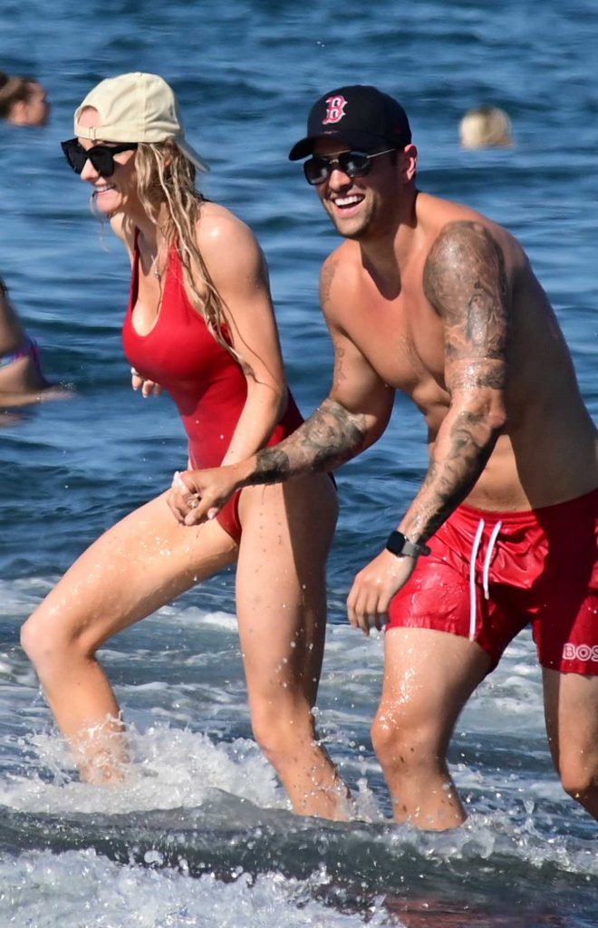 Katie McGlynn in a Red Swimsuit