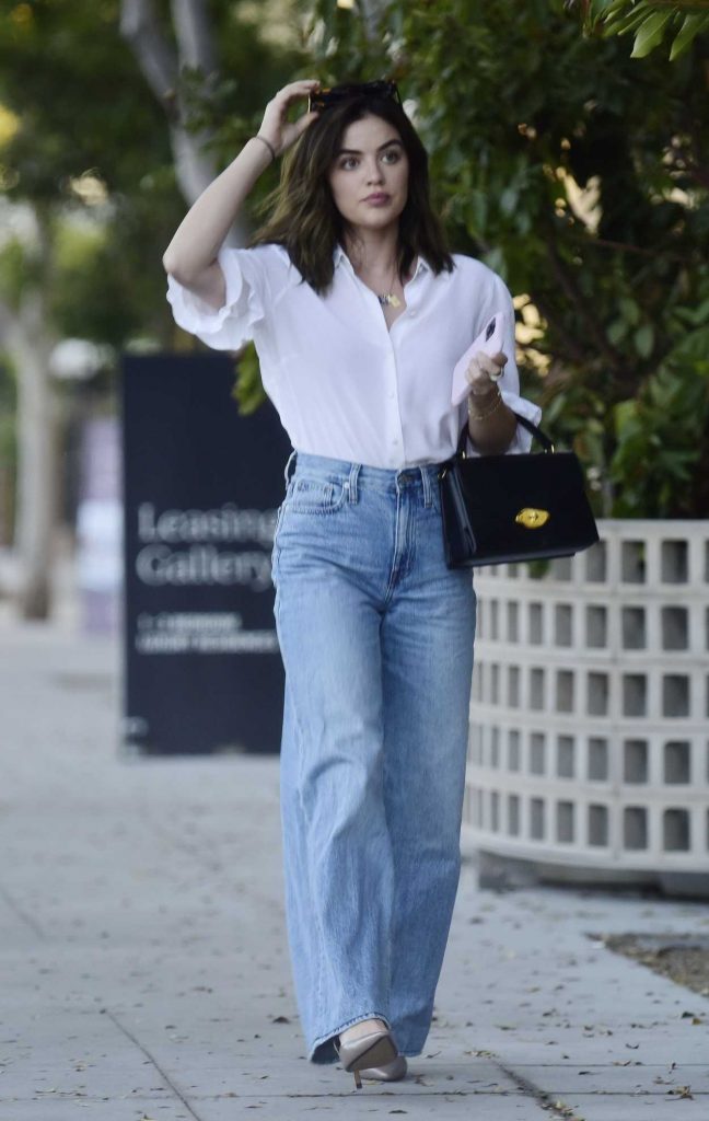 Lucy Hale in a White Blouse