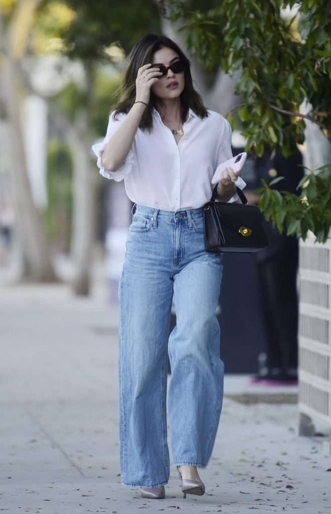 Lucy Hale in a White Blouse