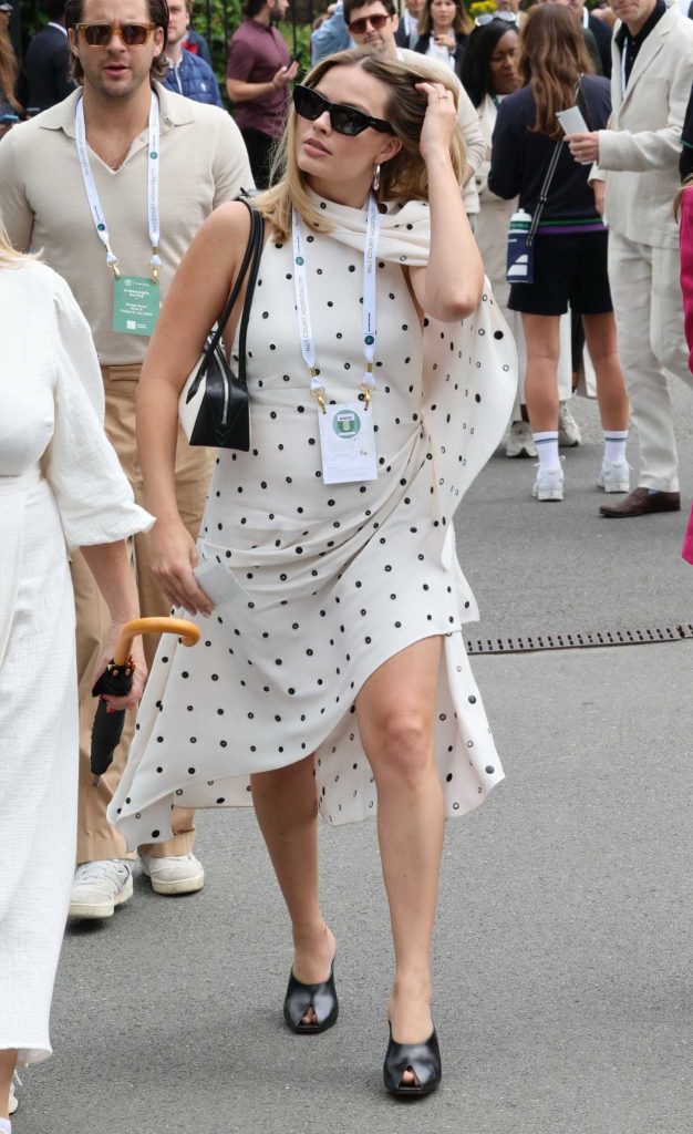 Margot Robbie in a White Polka Dot Dress