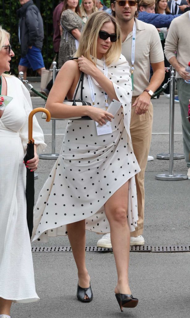 Margot Robbie in a White Polka Dot Dress