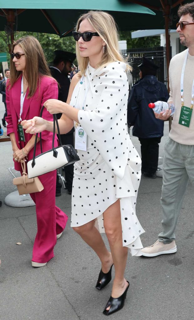 Margot Robbie in a White Polka Dot Dress