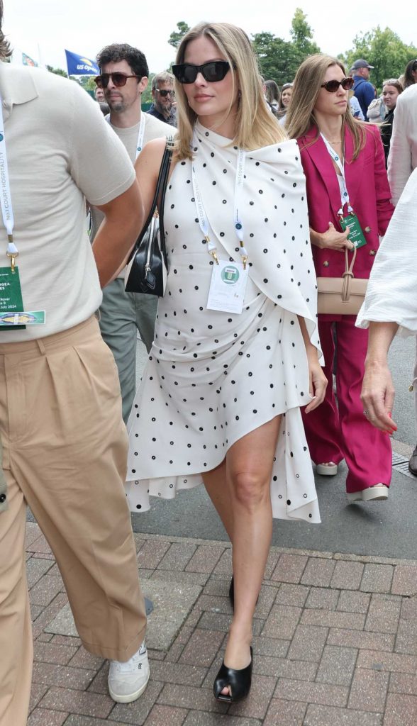 Margot Robbie in a White Polka Dot Dress