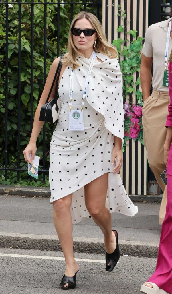 Margot Robbie in a White Polka Dot Dress