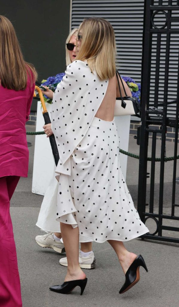 Margot Robbie in a White Polka Dot Dress