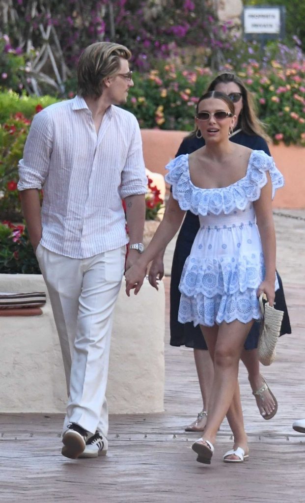 Millie Bobby Brown in a White Patterned Mini Dress