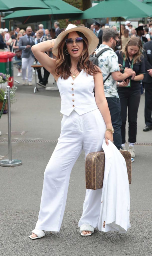 Myleene Klass in a White Pantsuit