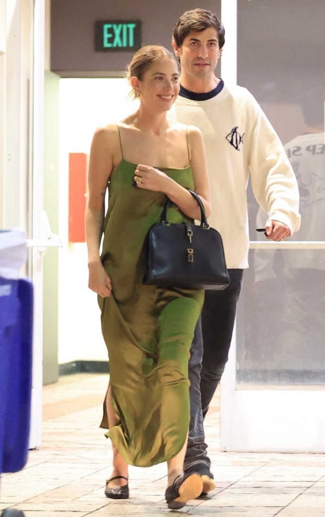 Ashley Benson in an Olive Dress