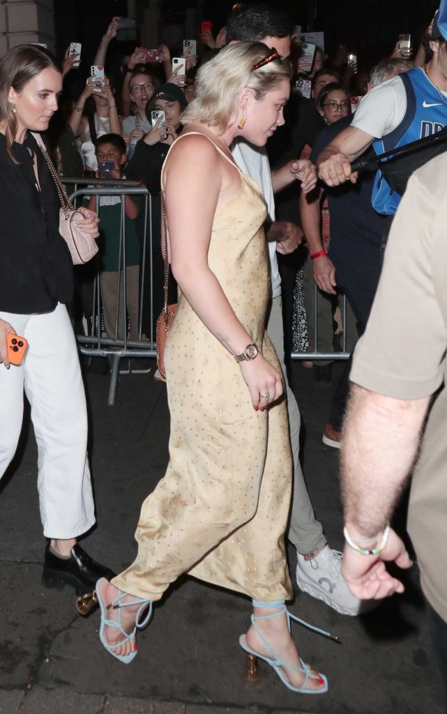 Florence Pugh in a Beige Dress