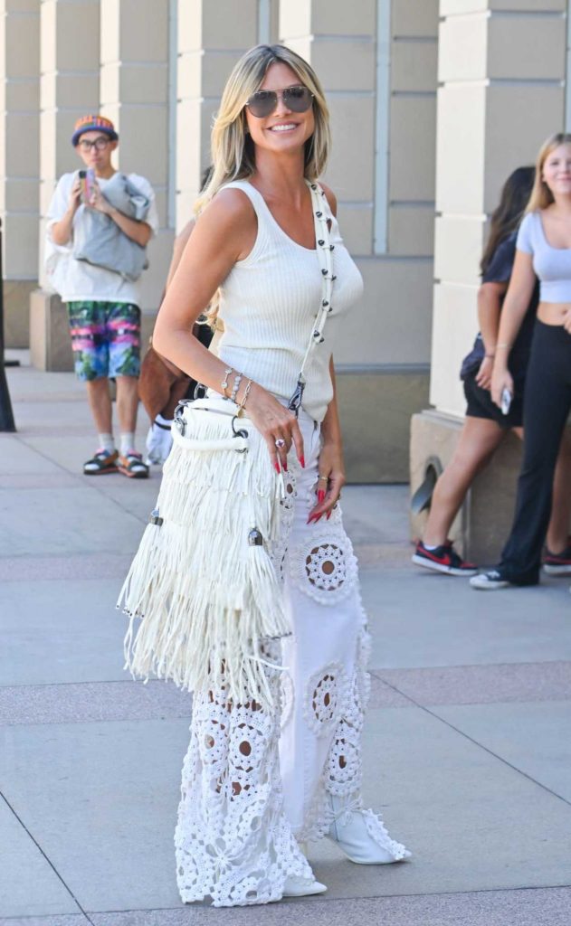 Heidi Klum in a White Lace Pants