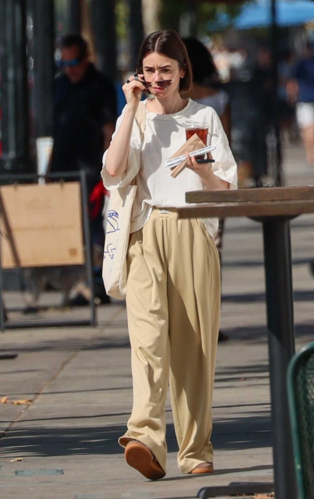 Lily Collins in a Beige Sweatpants