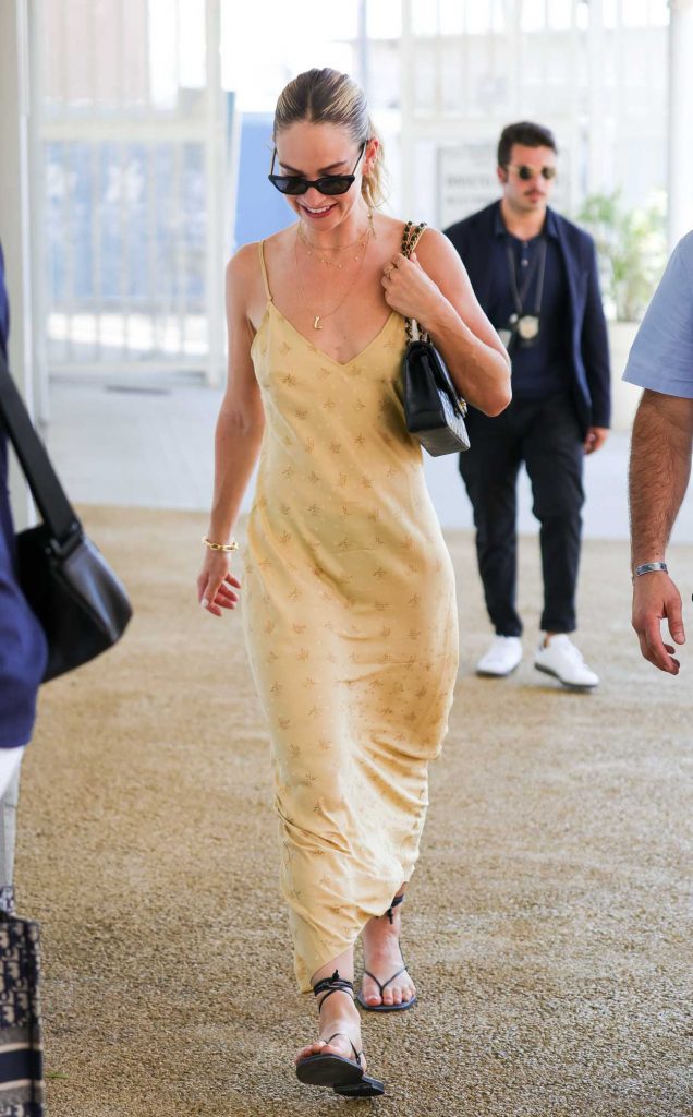 Lily James in a Beige Dress