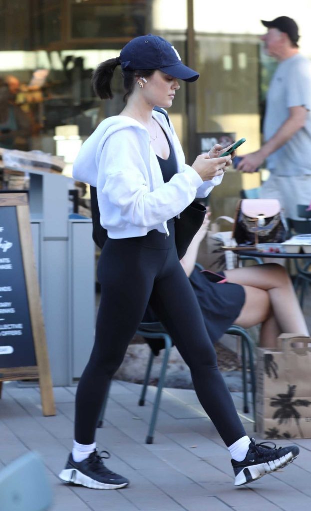 Lucy Hale in a Black Sneakers