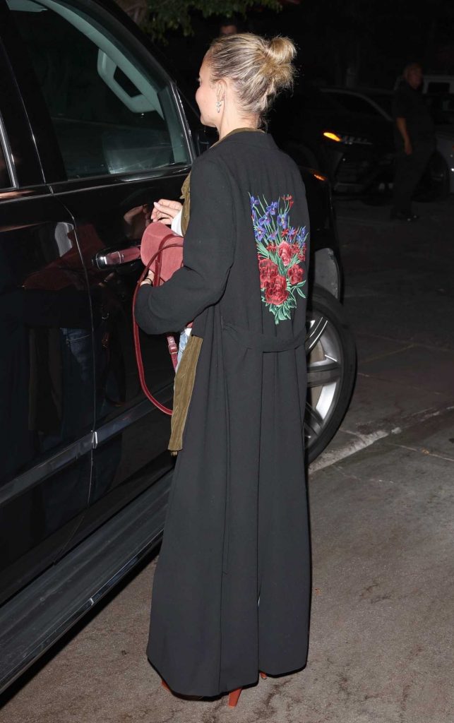 Nicole Richie in a Black Coat