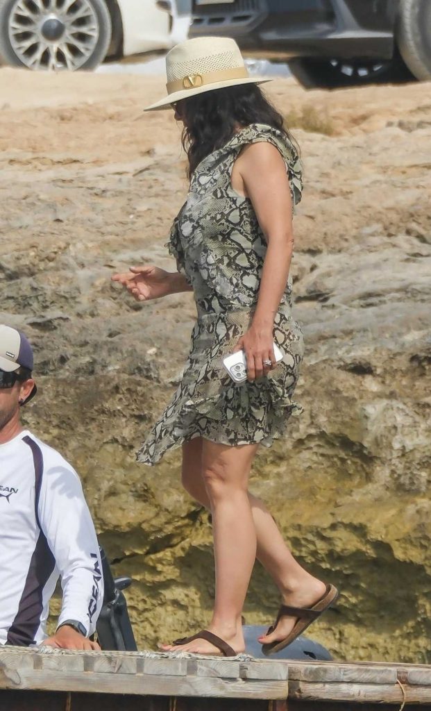 Salma Hayek in an Olive Snakeskin Mini Dress