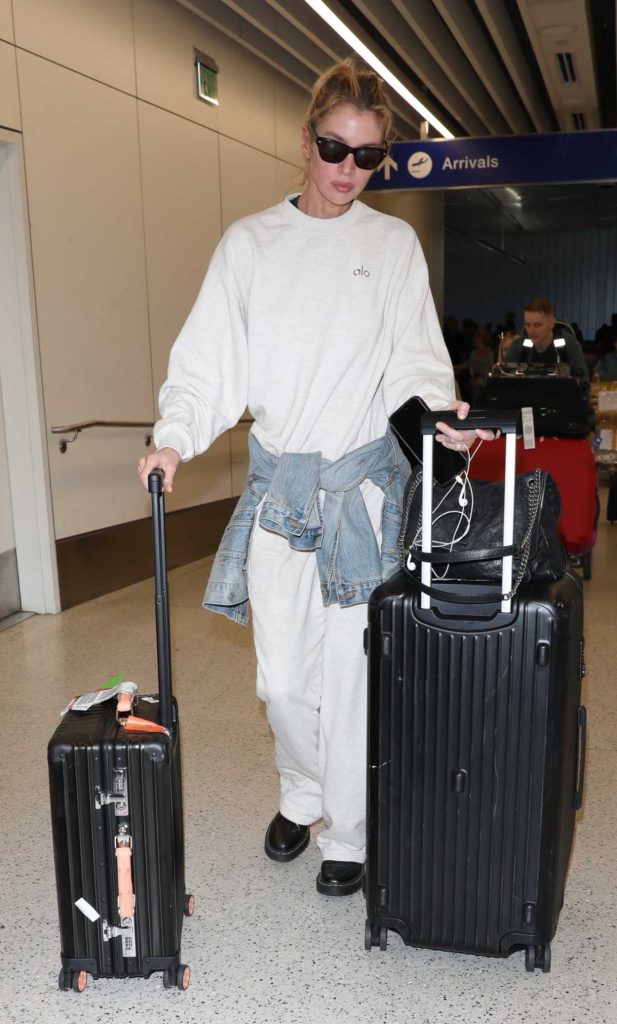 Stella Maxwell in a White Sweatsuit