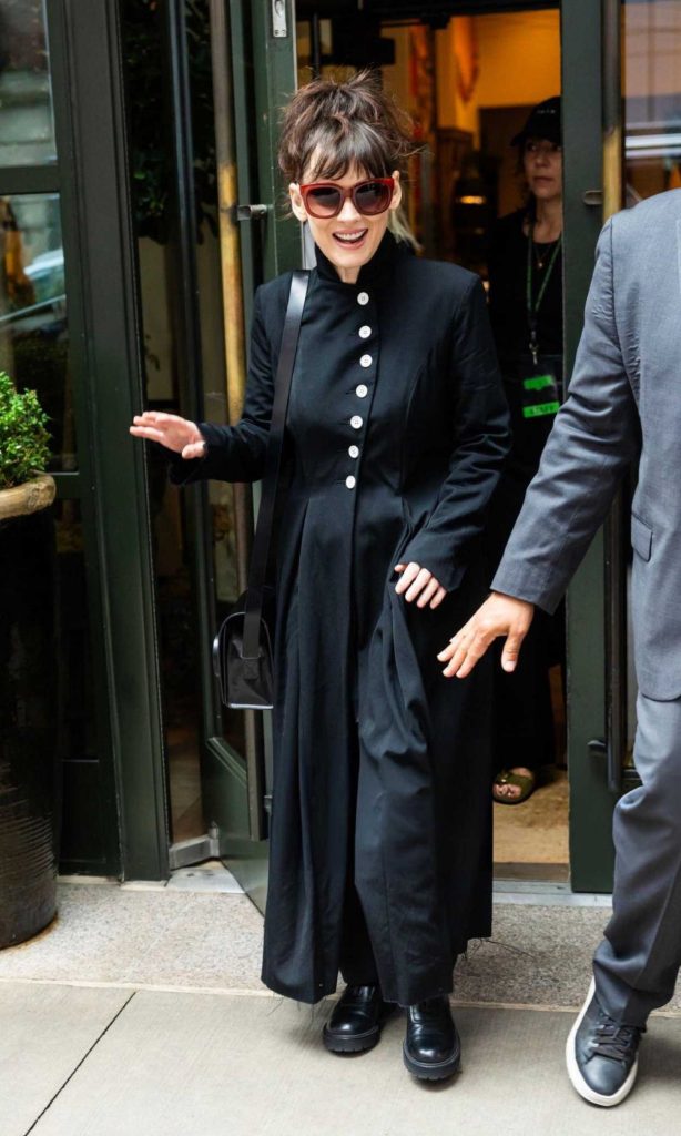 Winona Ryder in a Black Trench Coat