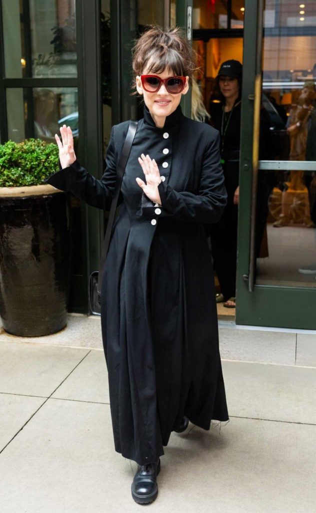 Winona Ryder in a Black Trench Coat