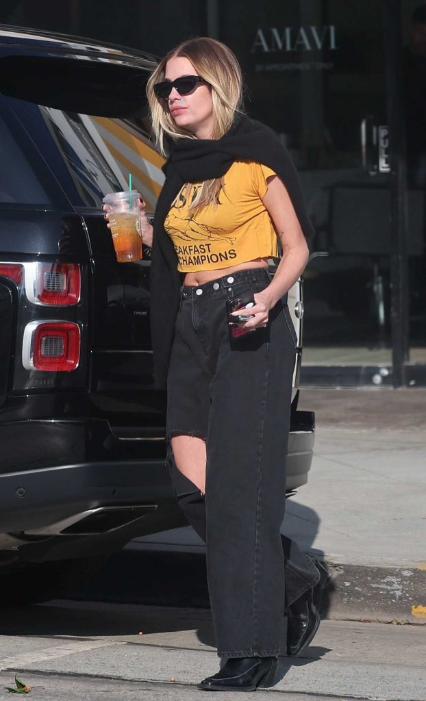 Ashley Benson in a Black Ripped Jeans