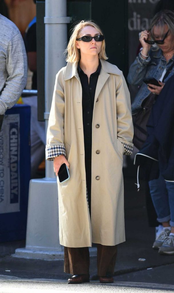 AnnaSophia Robb in a Beige Trench Coat