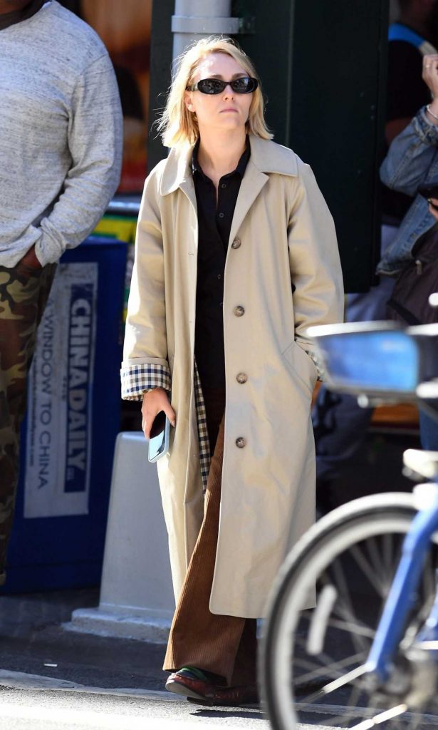 AnnaSophia Robb in a Beige Trench Coat