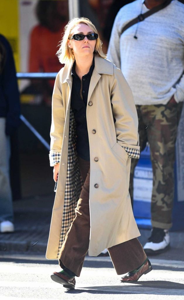 AnnaSophia Robb in a Beige Trench Coat