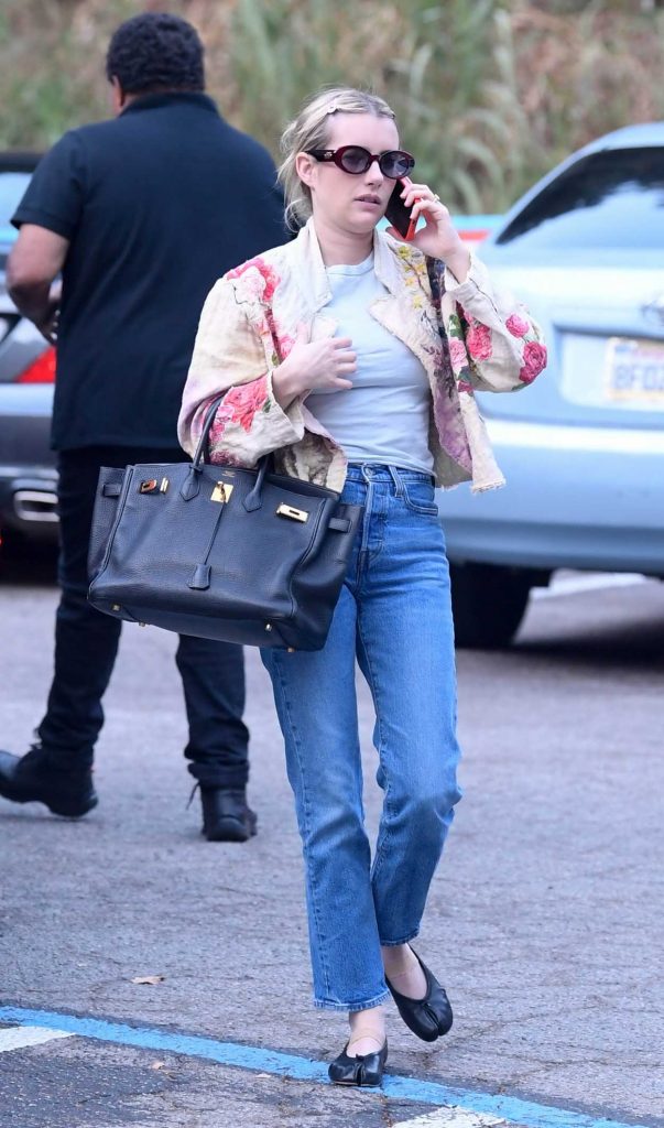 Emma Roberts in a Blue Jeans