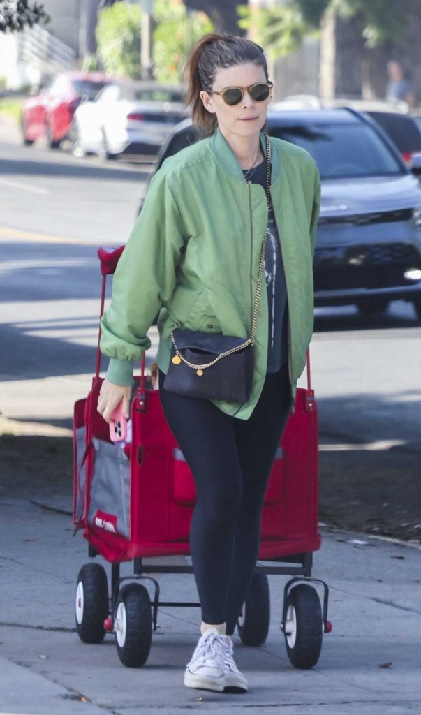 Kate Mara in an Olive Bomber Jacket