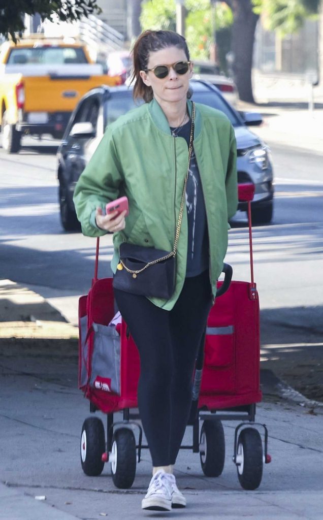 Kate Mara in an Olive Bomber Jacket