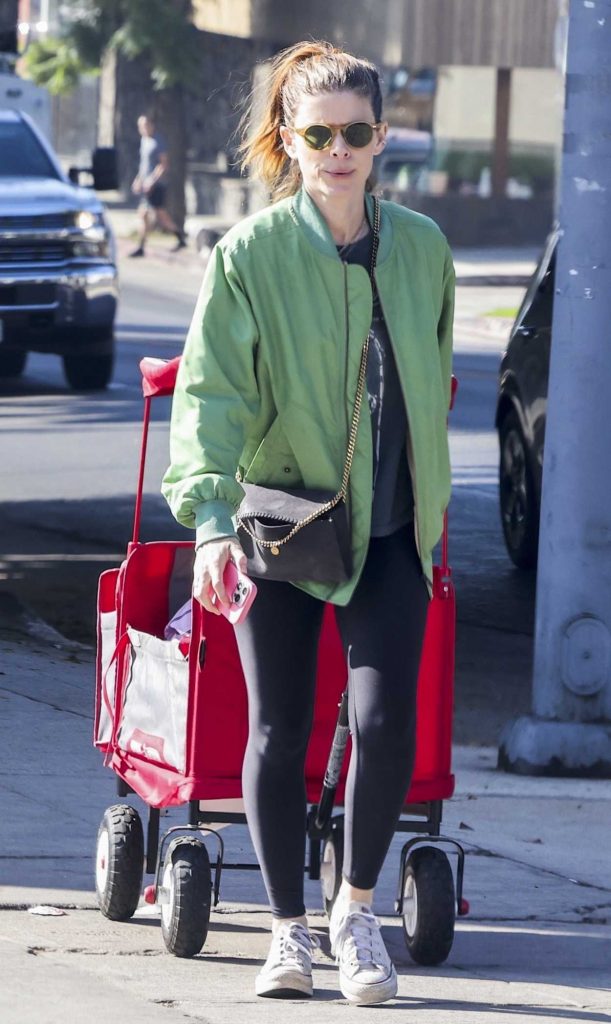 Kate Mara in an Olive Bomber Jacket