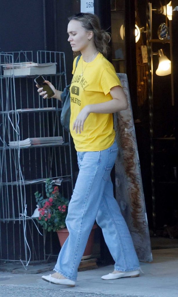 Lily-Rose Depp in a Yellow Tee