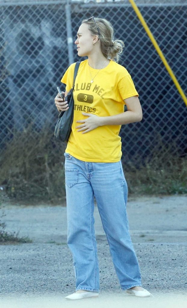 Lily-Rose Depp in a Yellow Tee