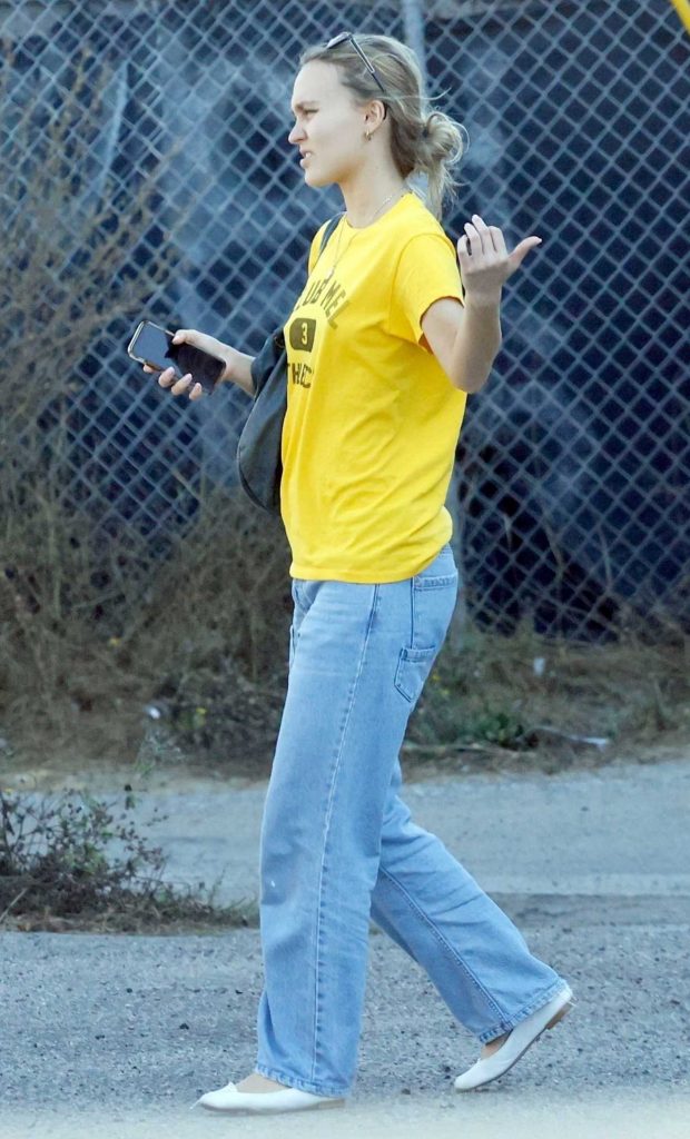 Lily-Rose Depp in a Yellow Tee