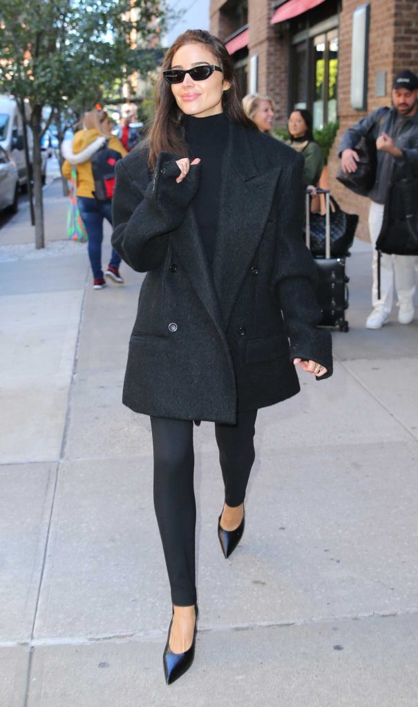 Olivia Culpo in a Black Coat