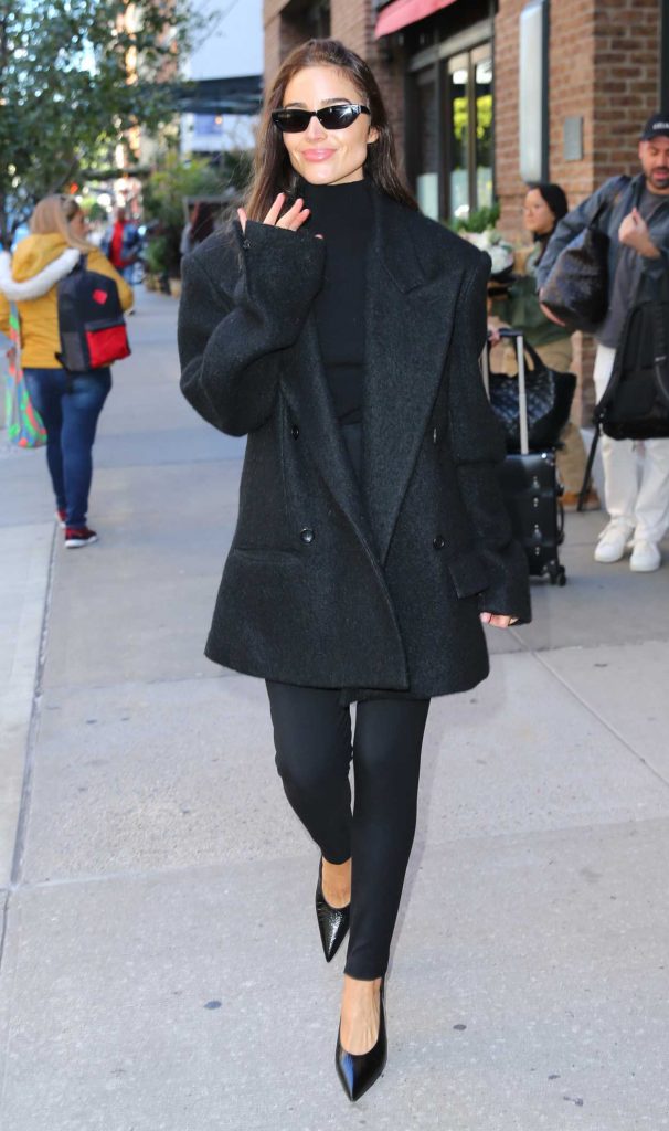 Olivia Culpo in a Black Coat