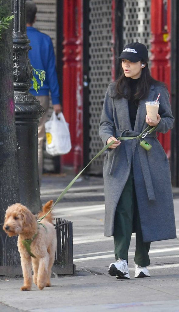 Rachel Zegler in a Grey Coat