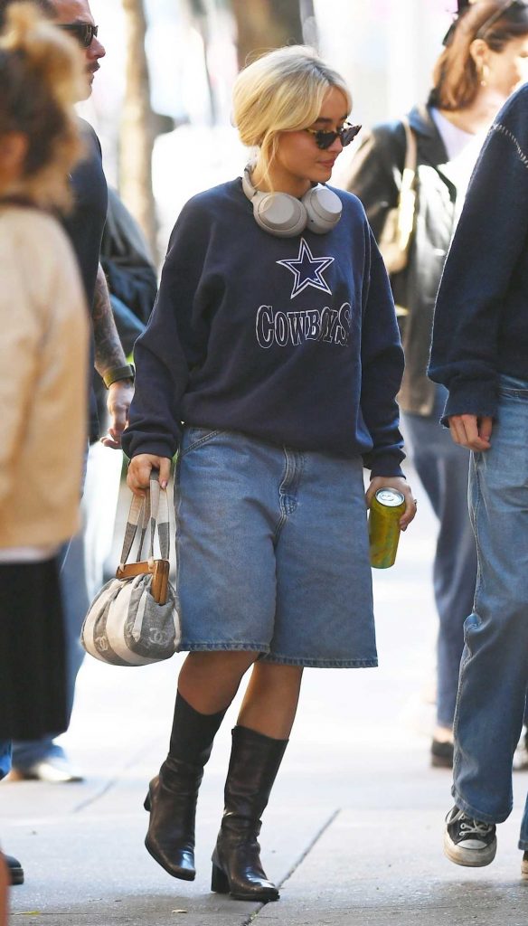 Sabrina Carpenter in a Navy Sweatshirt