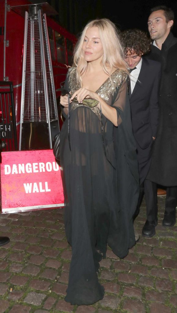 Sienna Miller in a Black See-Through Dress