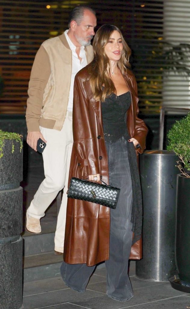 Sofia Vergara in a Brown Leather Coat