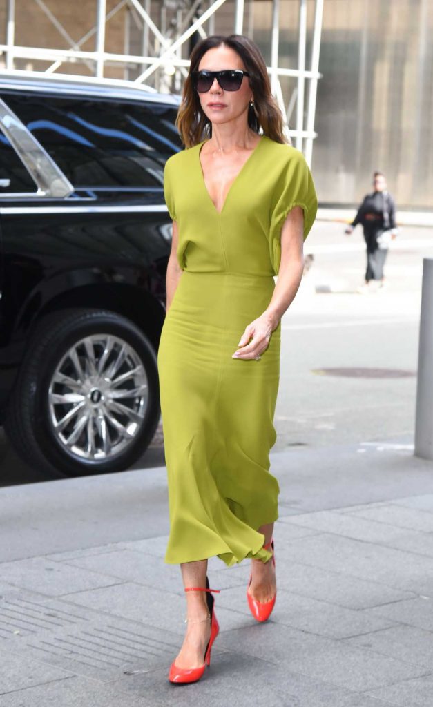 Victoria Beckham in an Olive Dress