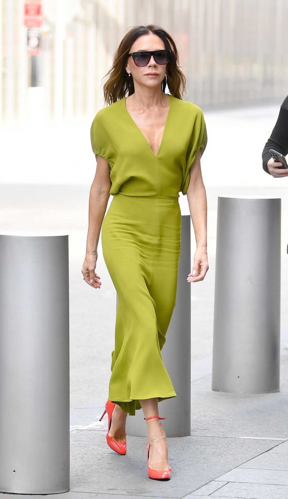 Victoria Beckham in an Olive Dress