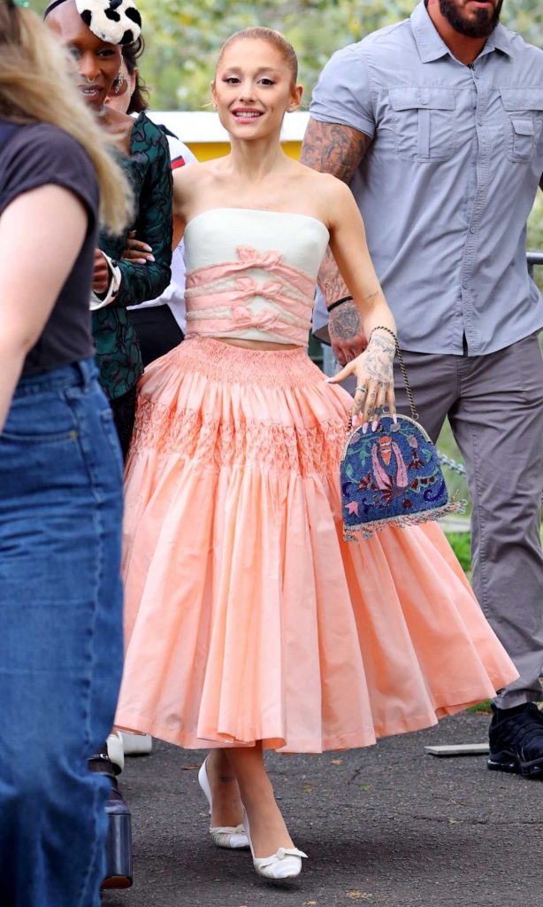 Ariana Grande in an Orange Skirt