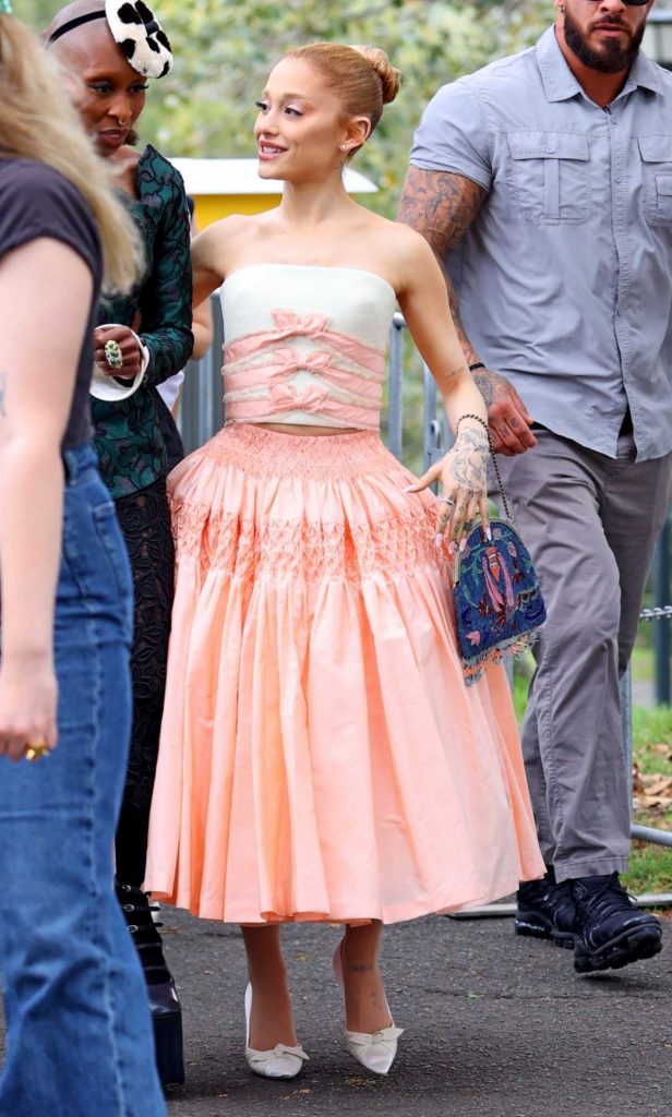 Ariana Grande in an Orange Skirt