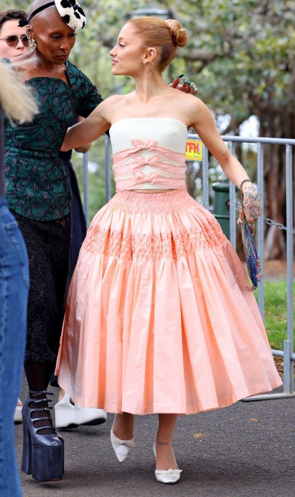 Ariana Grande in an Orange Skirt