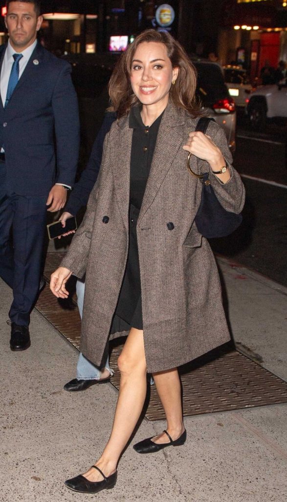 Aubrey Plaza in a Brown Coat