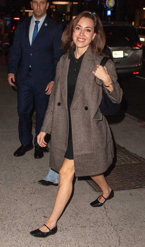 Aubrey Plaza in a Brown Coat