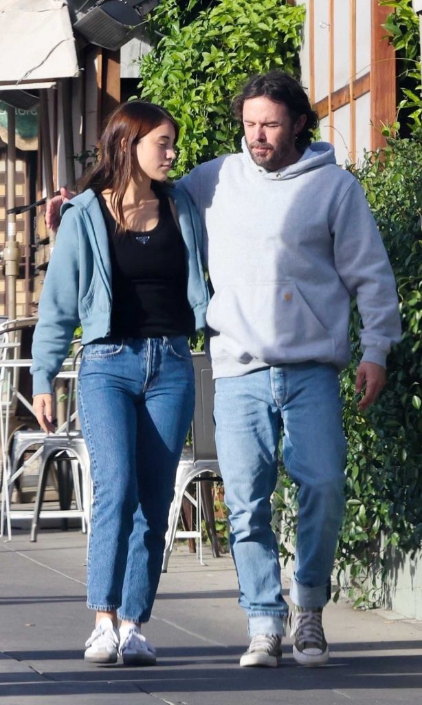 Caylee Cowan in a White Sneakers