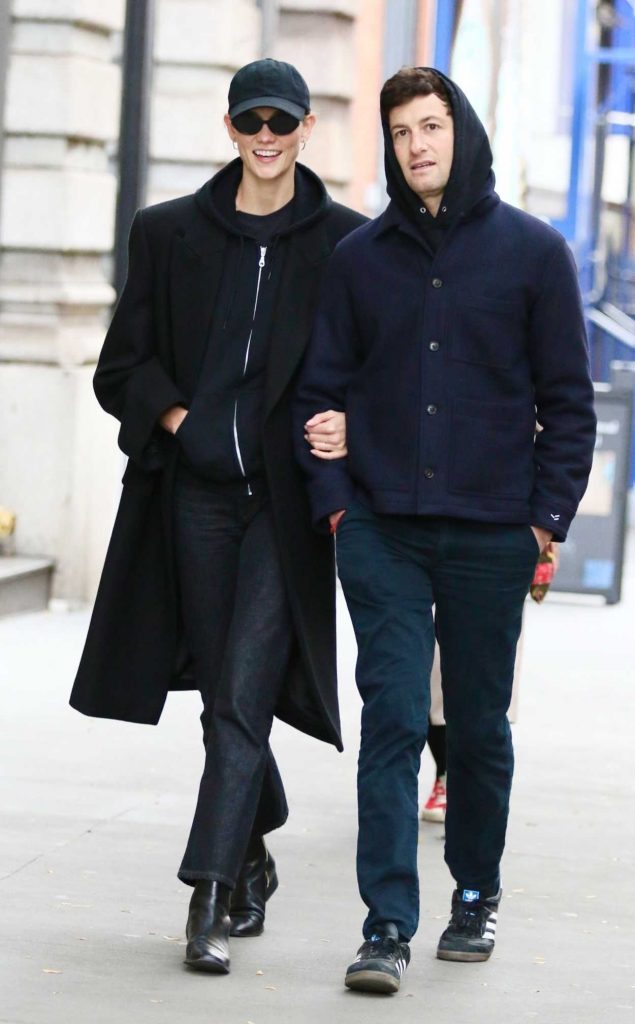 Karlie Kloss in a Black Coat