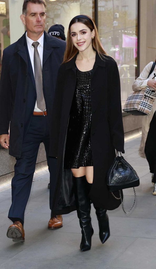 Kiernan Shipka in a Black Coat