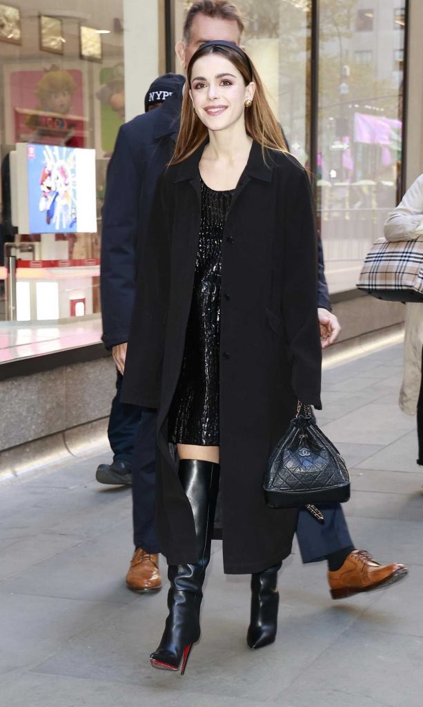 Kiernan Shipka in a Black Coat